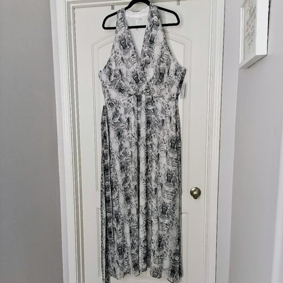 NJ COLLECTION Chiffon Maxi Dress with a Halter Neckline and Tie-Back Closure. - Picture 1 of 11